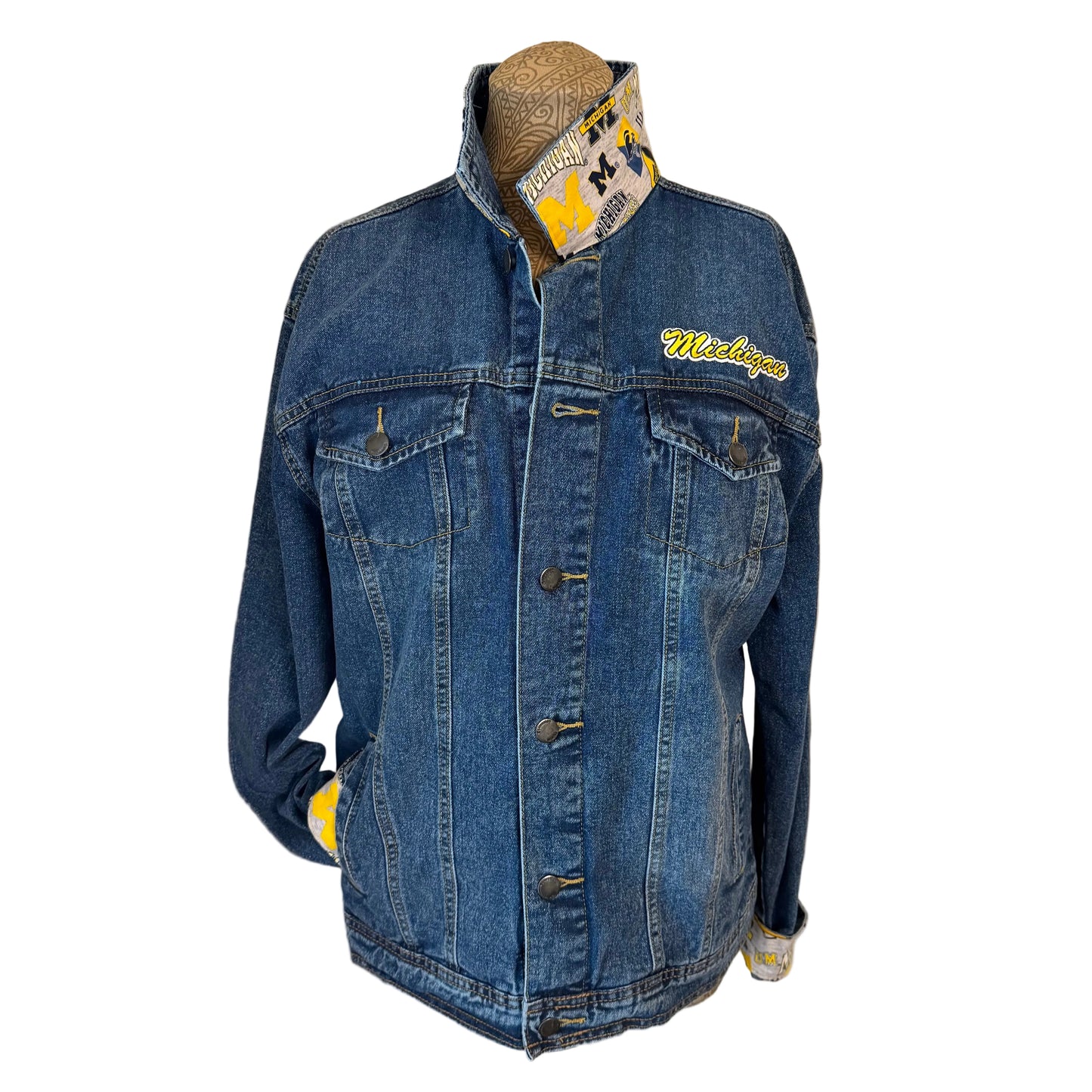 Blue denim jacket with 'Michigan' embroidery