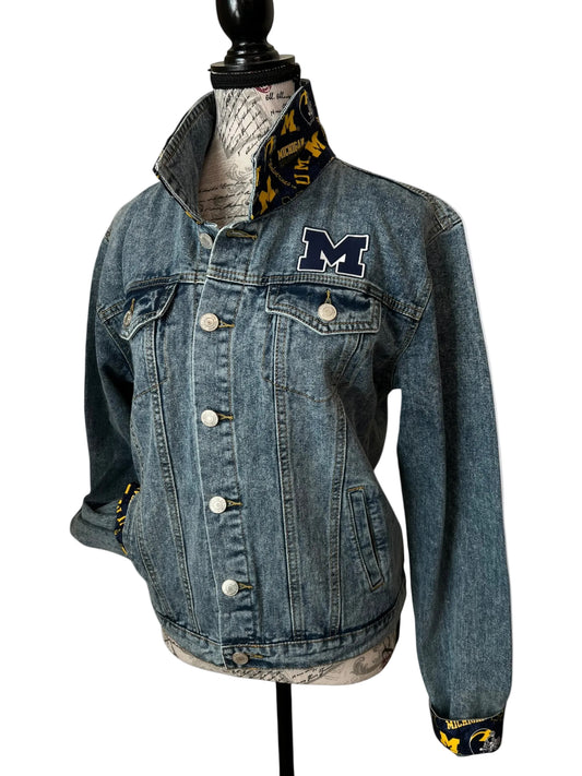 Blue denim jacket with a logo