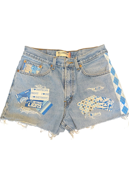 Levi 550 W 32 distressed blue denim cut off short shorts. I accented with with Detroit Lions.