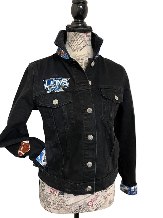 Black denim jacket with a logo 