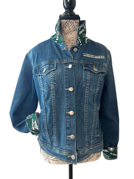 Blue denim jacket with Michigan State logo 