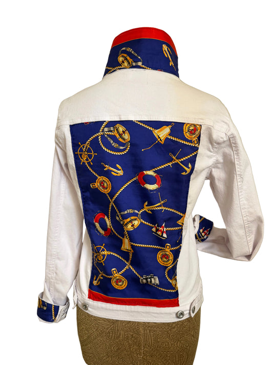 White jacket with a blue nautical-themed scarf draped over the back on a white background
