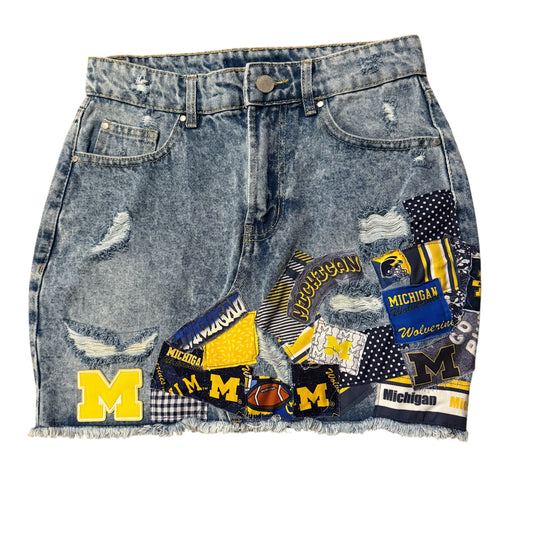 Denim shorts with Michigan-themed patches 