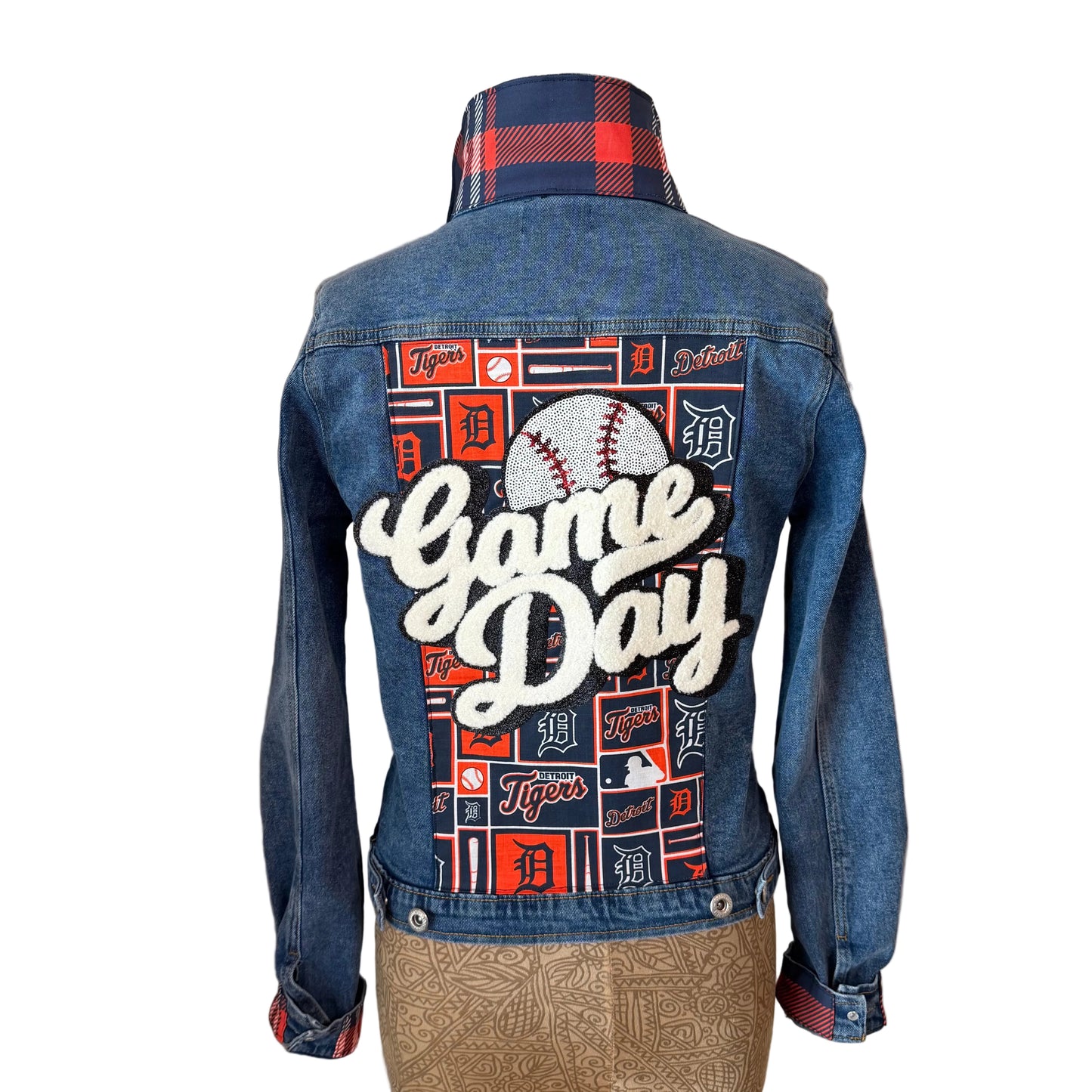 Blue denim jacket with 'Game Day' and baseball design 