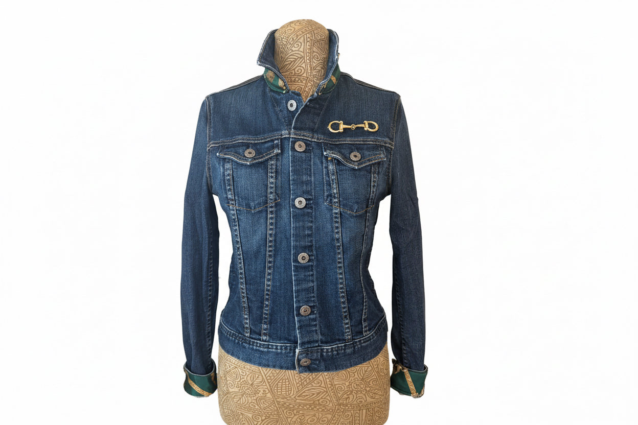 Blue denim jacket with a decorative button 