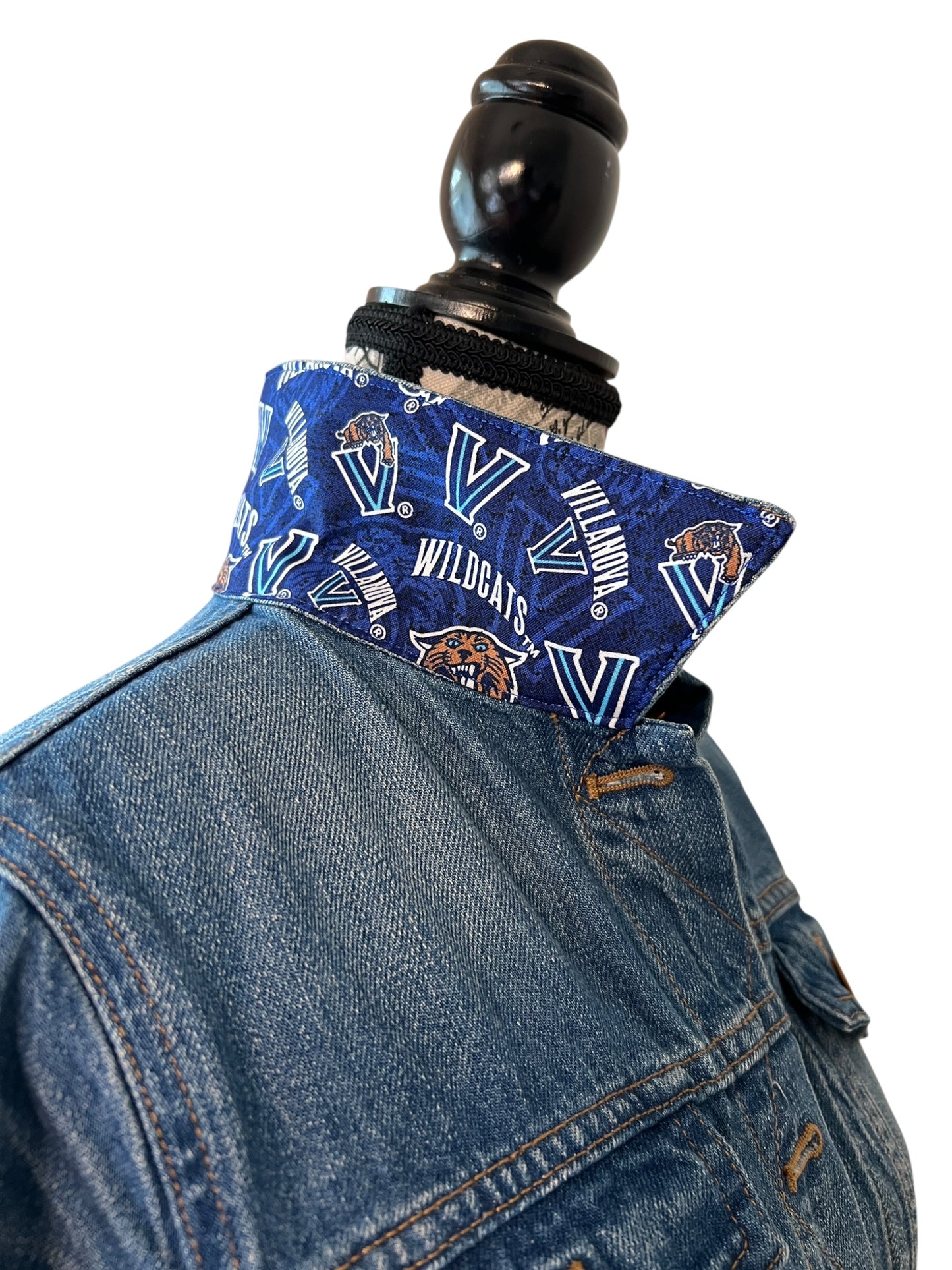 Blue denim jacket with a matching patterned vest 